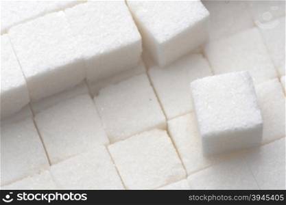 close up of white sugar cubes