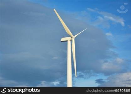 Close up of Wind turbines with blue sky background