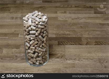Close-up of wine corks in a glass
