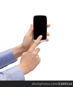 close up of woman hand pointing at smartphone display