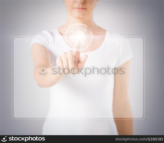 close up of woman hand touching virtual screen