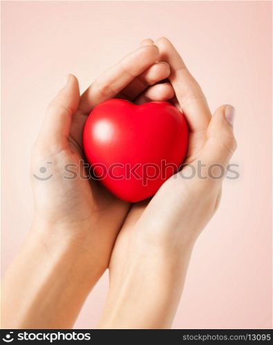 close up of woman hands with heart