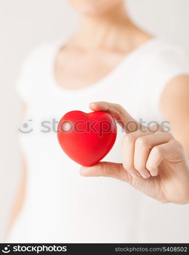 close up of woman hands with heart