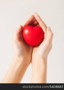 close up of woman hands with heart