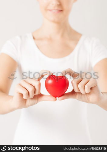 close up of woman hands with heart