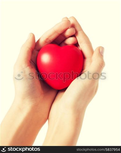 close up of woman hands with heart