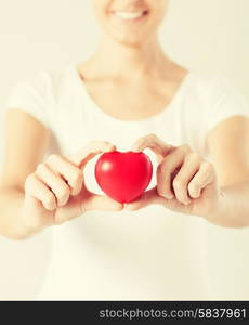 close up of woman hands with heart