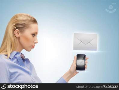 close up of woman holding phone with sign of sms