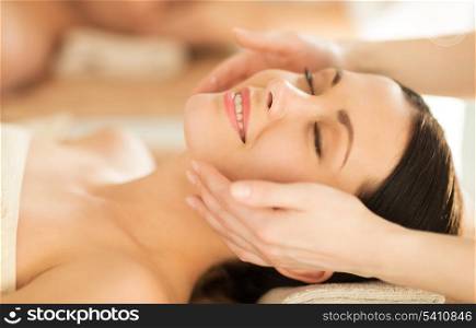 close up of woman in spa salon getting face treatment