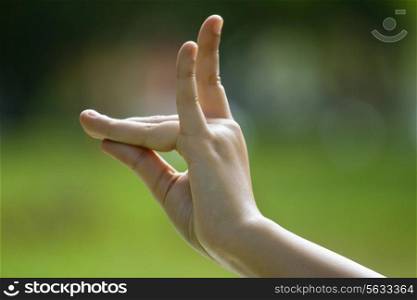Close-up of woman&rsquo;s hand in yoga gesture