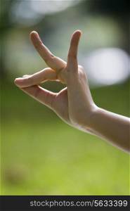 Close-up of woman&rsquo;s hand in yoga gesture