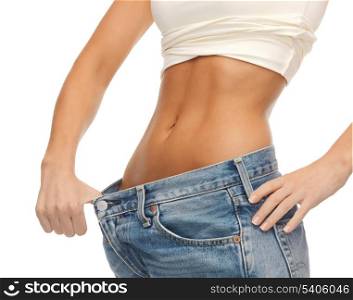 close up of woman showing big pants