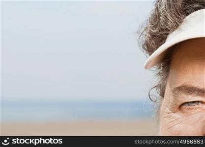 Close up of woman wearing a sun visor