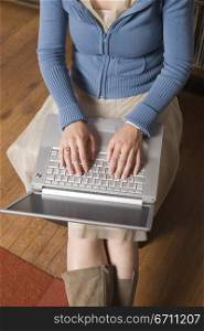 Close up of woman with a laptop