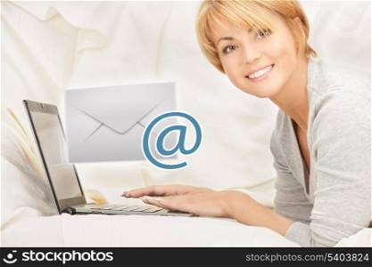 close up of woman with laptop computer sending e-mail