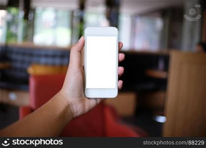 Close up of women's hands holding cell telephone blank copy space screen. smart phone with technology concept.