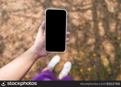 Close up of women&rsquo;s hands holding cell telephone blank copy space screen. smart phone with technology