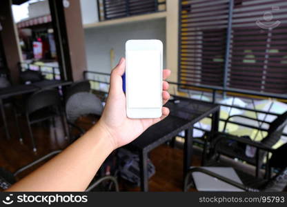 Close up of women's hands holding cell telephone blank copy space screen. smart phone with technology concept.