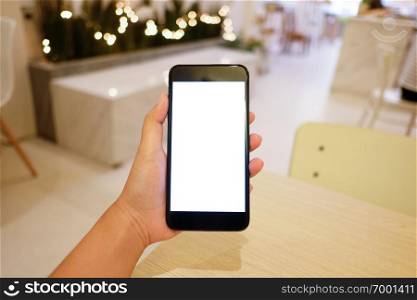 Close up of women’s hands holding cell telephone blank copy space screen. smart phone with technology concept.