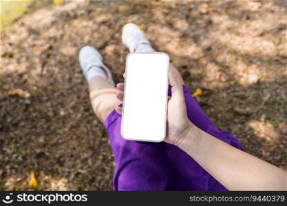 Close up of women’s hands holding cell telephone blank copy space screen. smart phone with technology