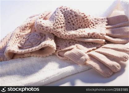 Close-up of woolen gloves on a towel