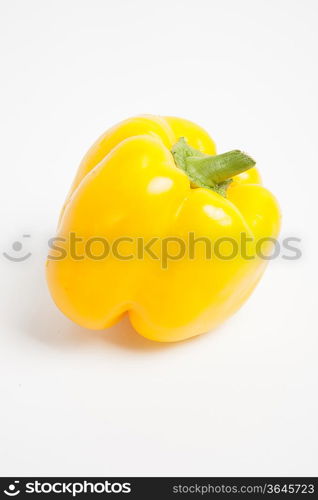 Close-up of yellow bell pepper over white background