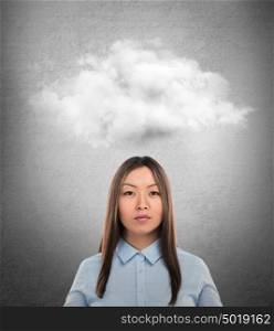 Close up of young asian woman with thought bubble above her head with copy space