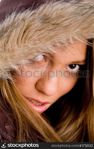close up of young female wearing winter coat on an isolated white background