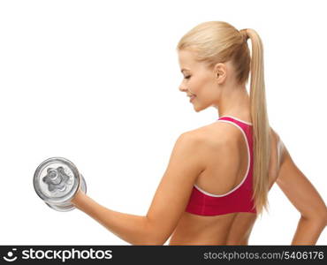 close up of young sporty woman with heavy steel dumbbell