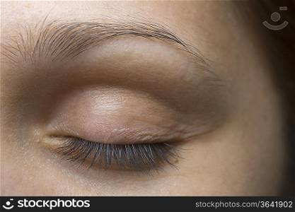 Close-up of young woman&acute;s closed eye