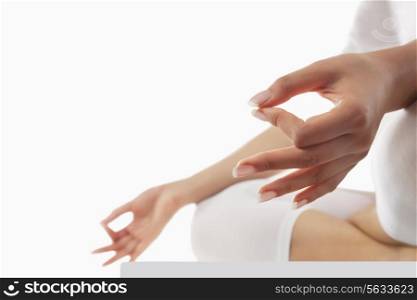 Close-up of young woman&rsquo;s hand with yoga gesture called guyan mudra