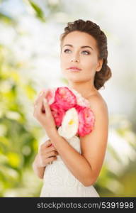 close up of young woman with bouquet of flowers