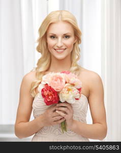 close up of young woman with bouquet of flowers