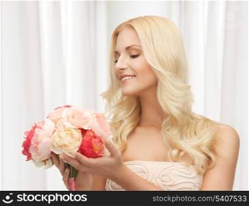 close up of young woman with bouquet of flowers