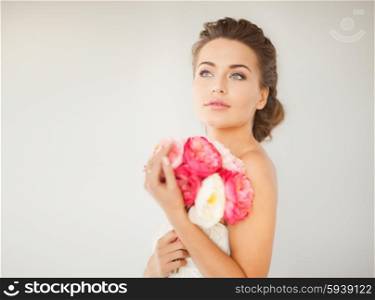 close up of young woman with bouquet of flowers.. woman with bouquet of flowers