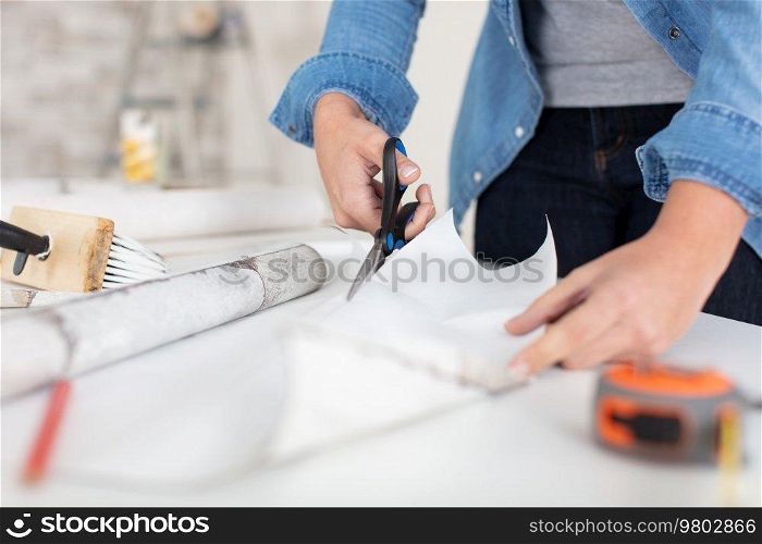 close-up of young womans hands doing diy