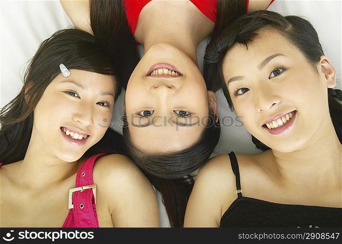 Close up of young women lying