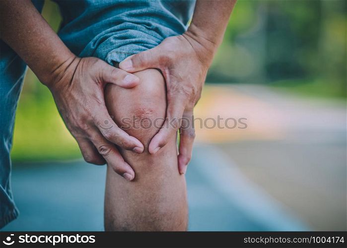 Close up old man knee pain
