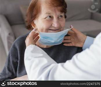 close up old woman with face mask