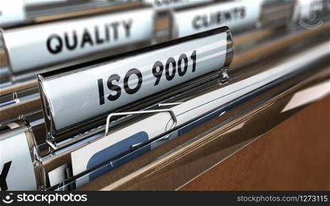 Close up on a file tab with the word ISO 9001, focus on the main text and blur effect. Concept image for illustration of Quality Standards. Quality Standards ISO 9001