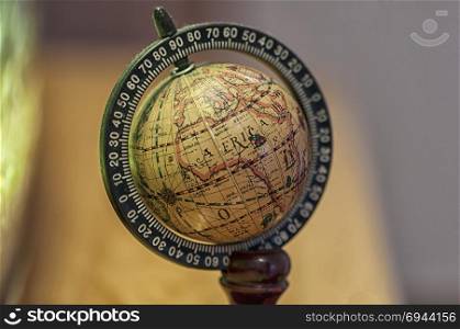 Close-up on a small globe with focus on Africa