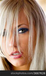 close-up on beautiful face of sensual and blond haired girl