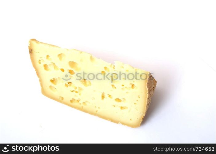 Close-up on Brittany tomme cheese. Brittany tomme cheese