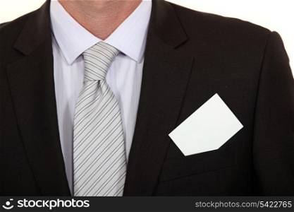 close-up on business card on businessman&rsquo;s suit