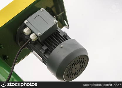 Close up on electric engine in agricultural machine. Industrial details of vehicles concept.. Electric engine in agricultural machine