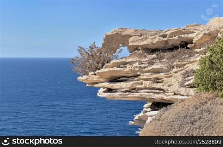 close up on formation cliff in limestone overlooking the see in Corsica at Bonifacio