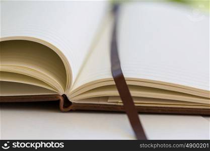 close up on open book pages. the opened book on the table