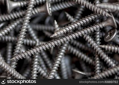 Close-up on screws, metal screws, iron screws, wood screws