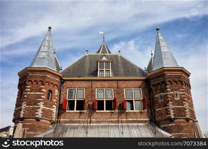 Close-up on the 15th century Waag (St Antoniespoort, Saint Anthony&rsquo;s Gate) gatehouse in Amsterdam, Netherlands.