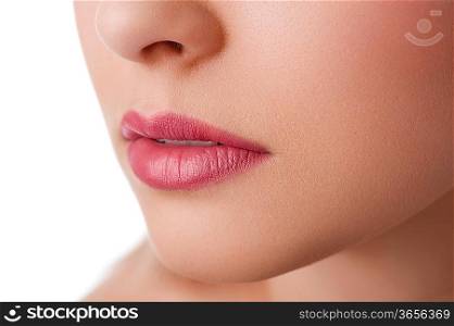 close up on the lips of a natural beauty model on white